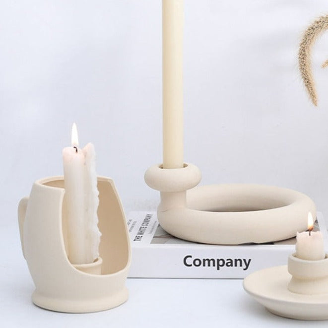 Portacandele a forma di tazza di sabbia