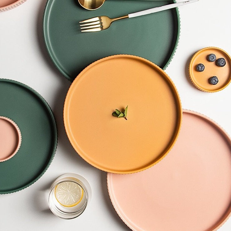 Oransje stripe runde middagstallerkener