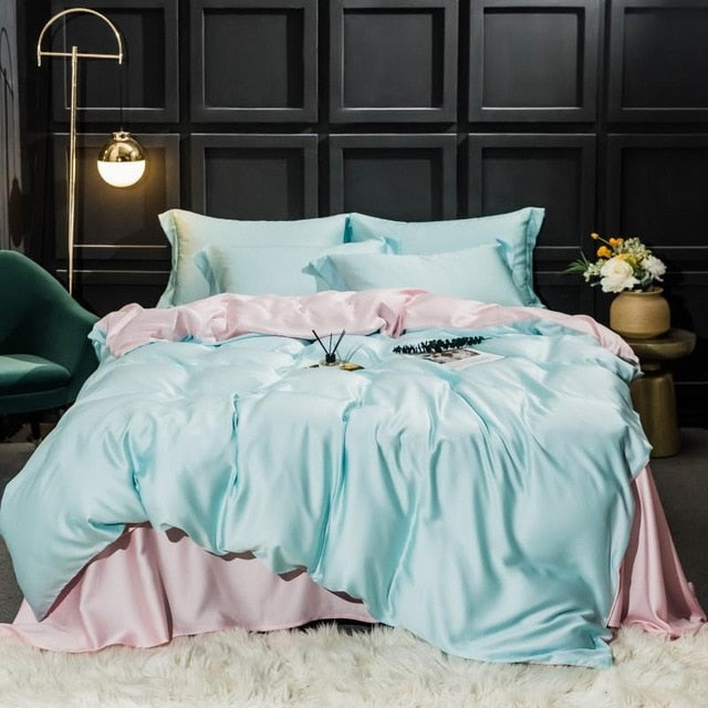 Set di biancheria da letto in seta pastello blu e rosa