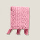 Couverture tricotée rose