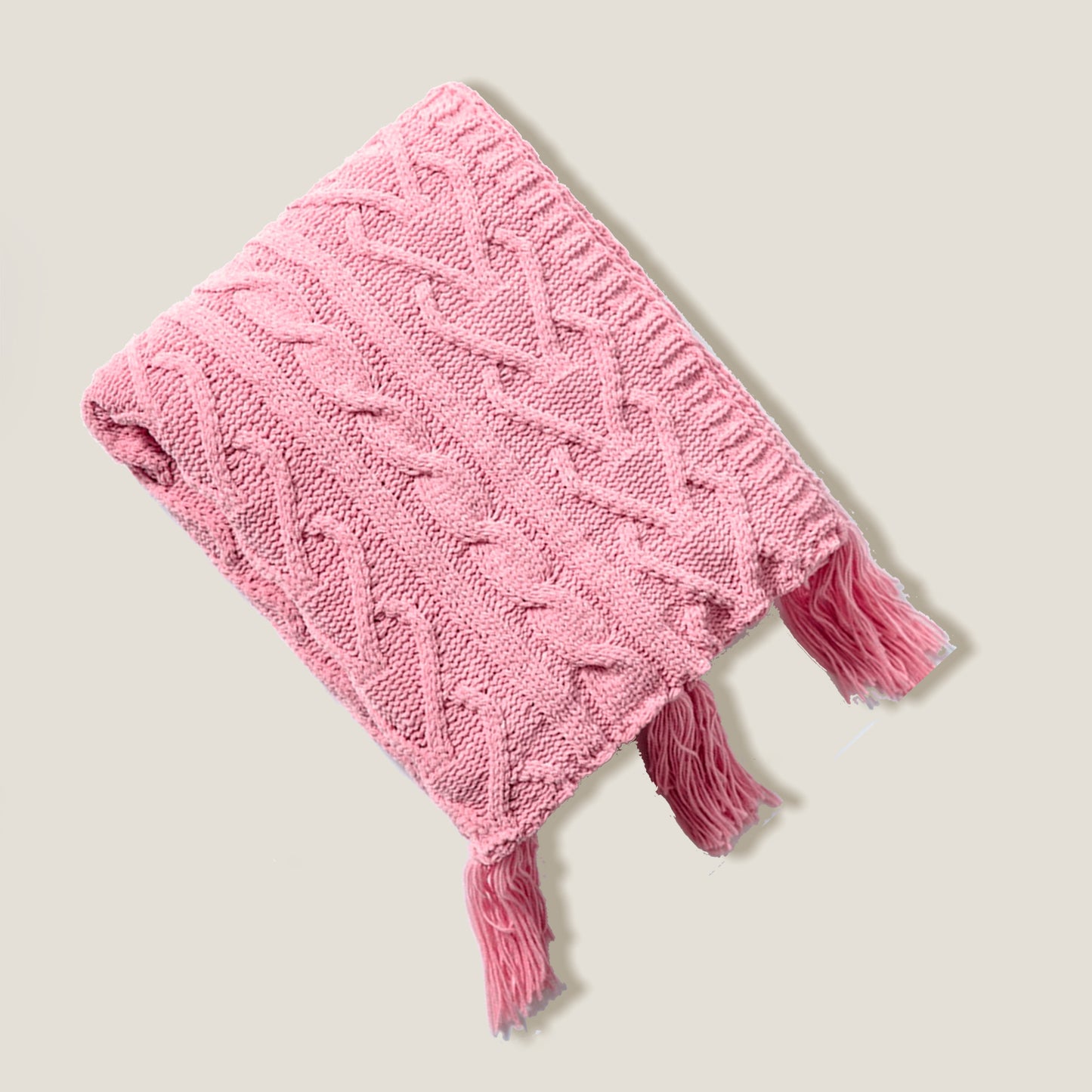 Rožnata pletena odeja