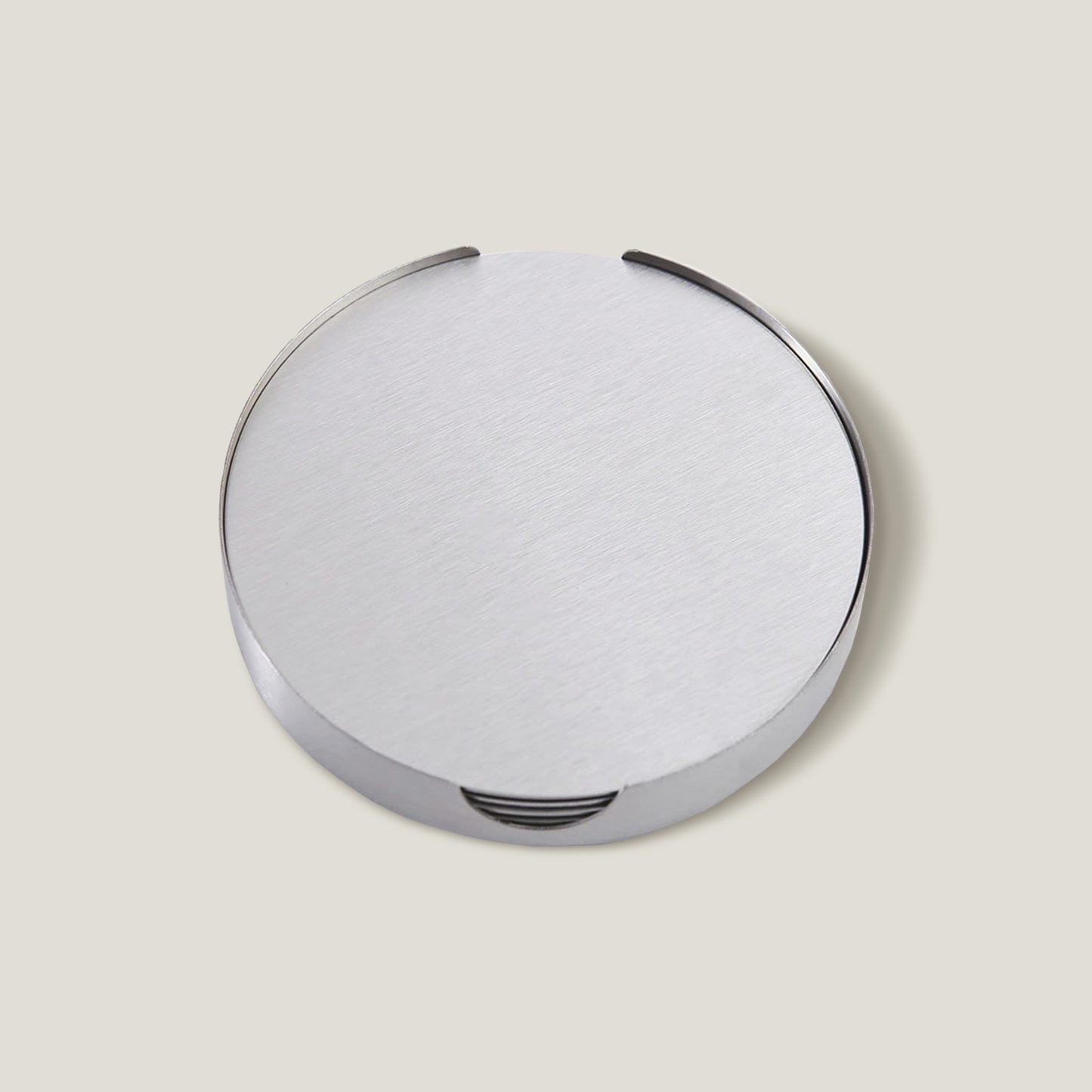 Juego de posavasos de acero inoxidable plateados con puntos