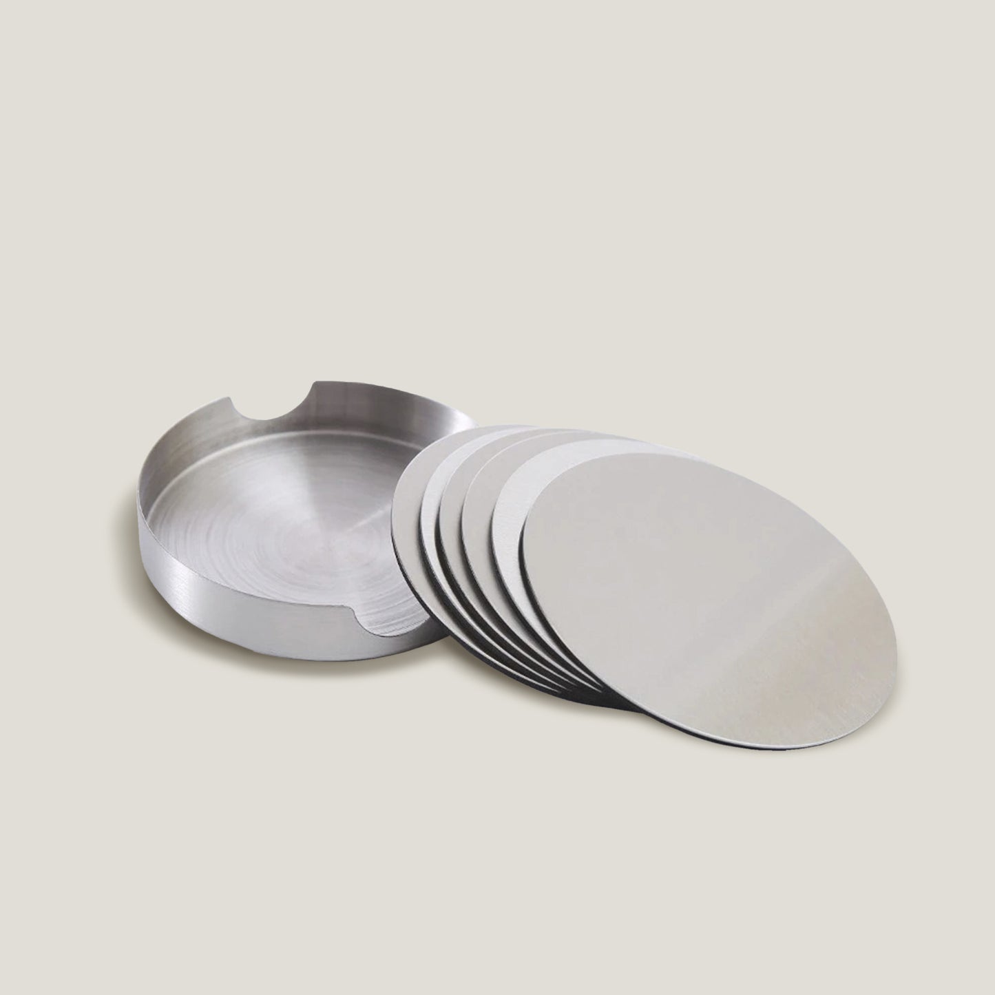 Juego de posavasos de acero inoxidable plateados con puntos