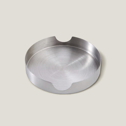 Juego de posavasos de acero inoxidable plateados con puntos