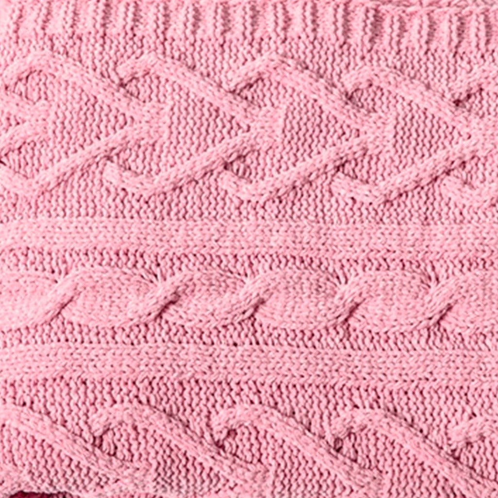 Couverture tricotée rose